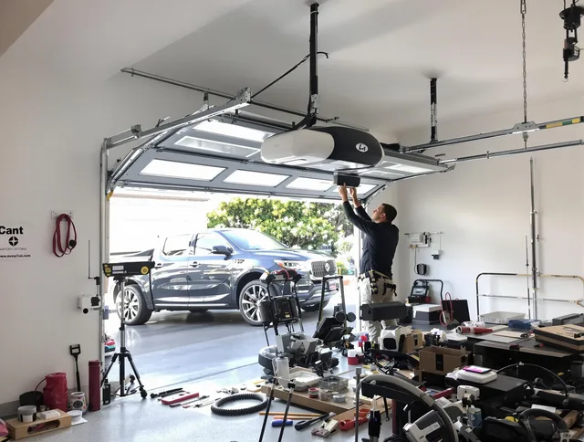 South Euclid Garage Door Repair specialist installing smart garage door opener system in South Euclid home