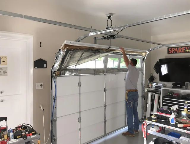 Garage door section replacement by South Euclid Garage Door Repair in South Euclid